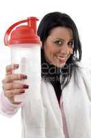 portrait of smiling woman posing with water bottle