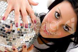 top view of woman holding disco mirror ball with white background