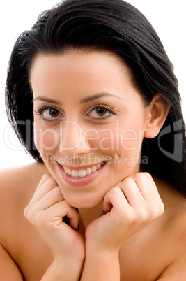 close up of smiling young woman with white background