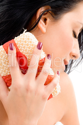 top view of woman scrubbing her neck on an isolated background