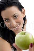 top view of woman showing apple