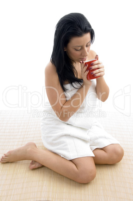 top view of woman holding coffee mug
