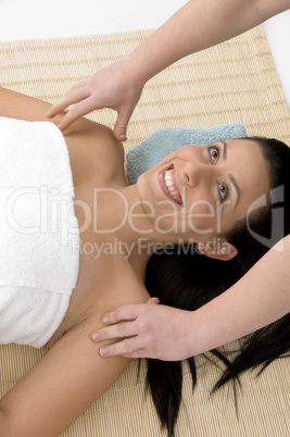 top view of smiling woman taking massage