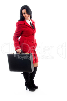 caucasian model holding leather bag