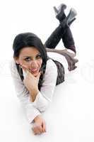 woman lying down on floor and looking at camera