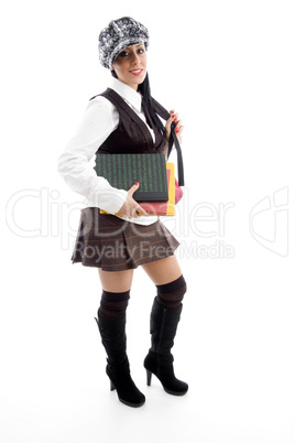 student with her books and school bag