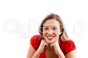 female model posing with her chin on fists