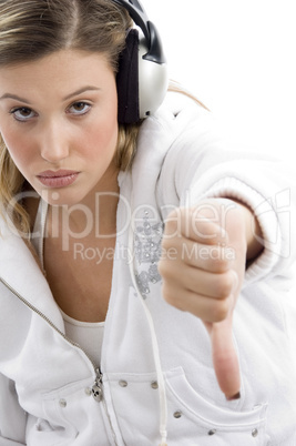 young woman showing thumbs down