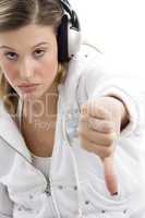young woman showing thumbs down