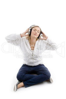 young model listening music with headphones