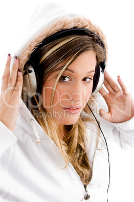 young female busy with music