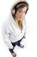 young model listening music with headphones