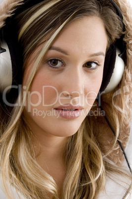 young woman enjoying music with headphones