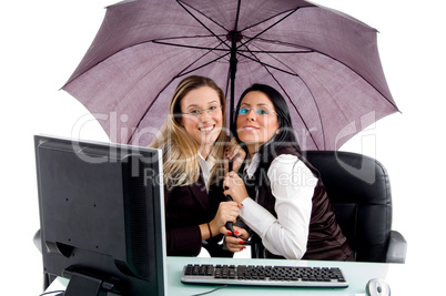 young attorney smiling and holding umbrella