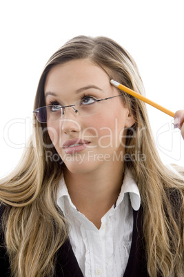 young female holding pencil