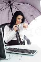 pointing woman with umbrella and computer