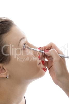 model getting eye makeup