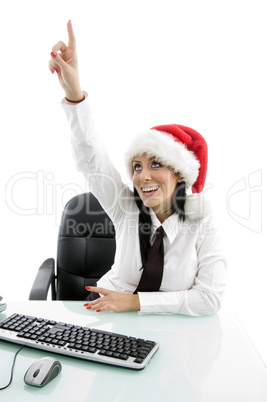 christmas woman pointing upward