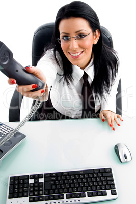 businesswoman showing phone receiver