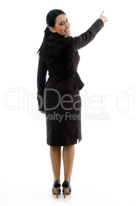 back pose of businesswoman indicating