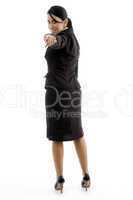 back pose of businesswoman pointing