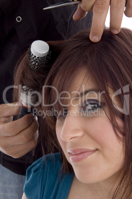 female taking haircut