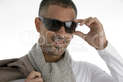 handsome male holding eyewear