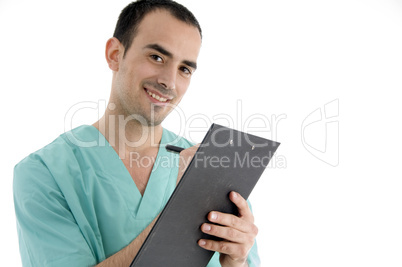 doctor writing on notepad