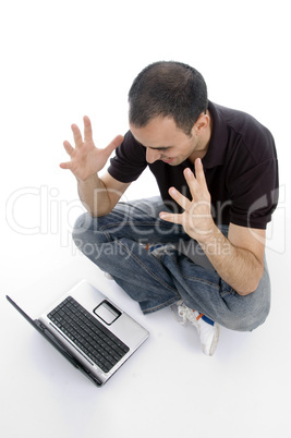 pleased man looking to laptop