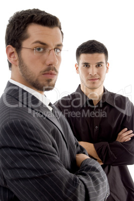 successful young executives posing with crossed arms