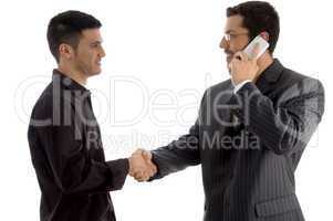 businesspeople communicating and shaking hand