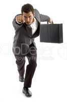 successful attorney showing punch and holding office bag