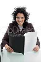 woman with folder file looking at camera