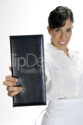 attractive waitress showing bill book