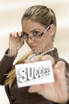 businesswomen holding  business card with three dimensional success text