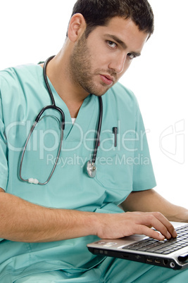 doctor with laptop and stethoscope
