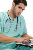 doctor with laptop and stethoscope