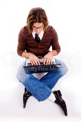 top view of sitting man working with computer