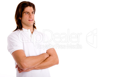 portrait of young man with folded hands