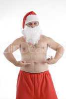 santa clause pointing his stomach