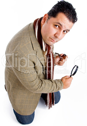 detective with tobacco pipe and magnifier
