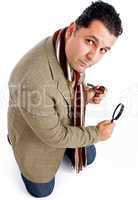 detective with tobacco pipe and magnifier