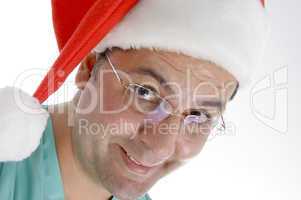 doctor wearing christmas hat