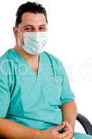 male doctor posing with face mask