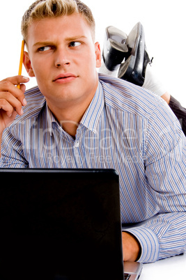 thinking man with laptop and pencil thinking man with laptop and pencil