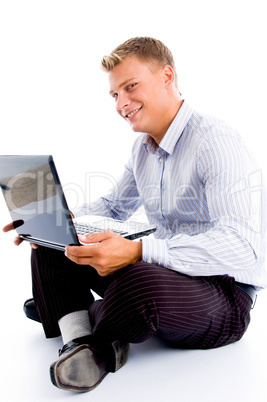 smiling male with laptop