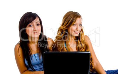 young female students with laptop