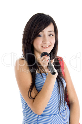 smiling girl posing with microphone