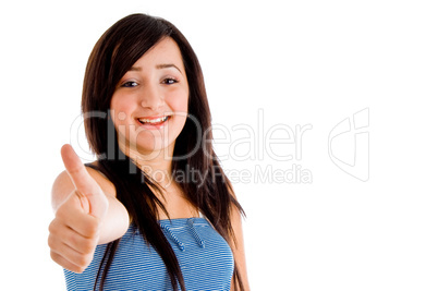 young girl showing you thumbs up