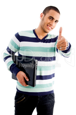 smiling boy with laptop and thumbs up